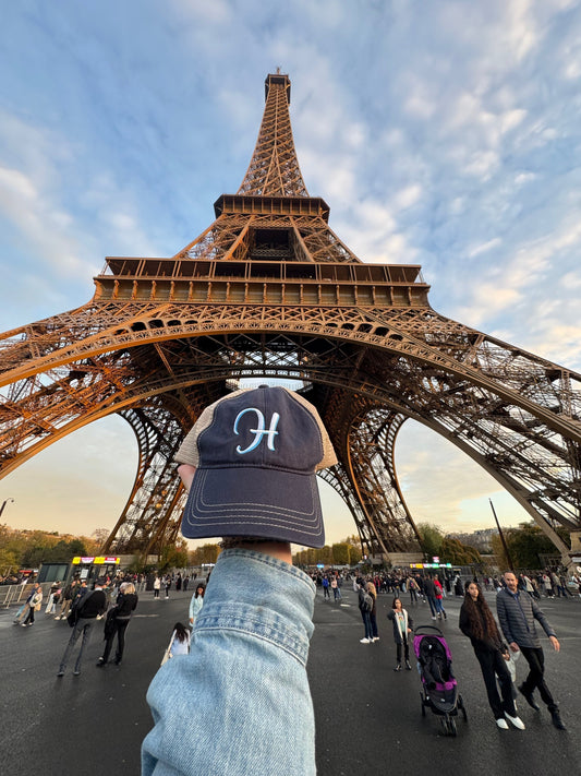 Herschede Store Hat in front of the Eiffel Tower