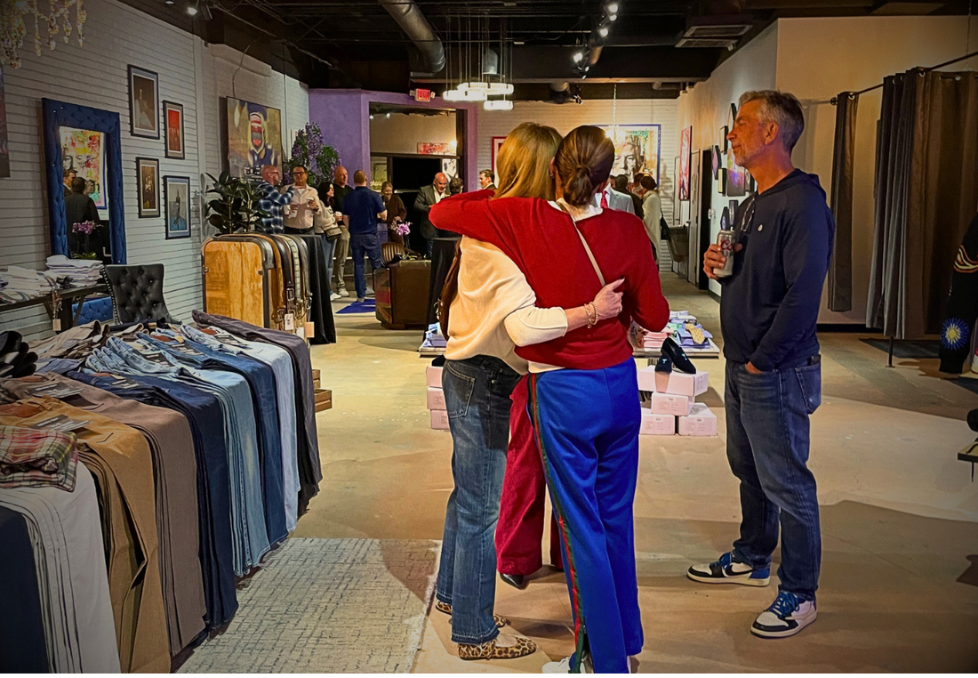 Picture of customers hugging in store